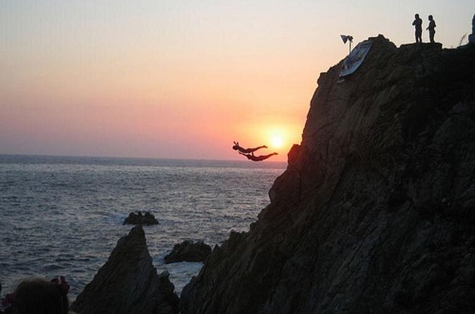 Acapulco Cliff Divers at Night - Who will enjoy this evening most