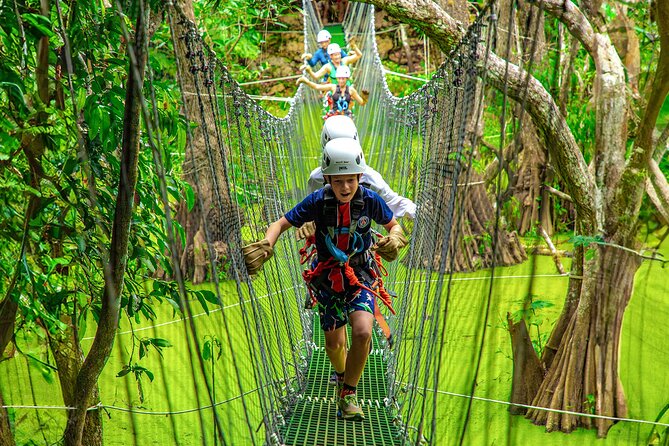 Adrenaline Adventure, Zip Line, ATV and Cenote Maya - Zip lines, hanging bridges, and a controlled rappel