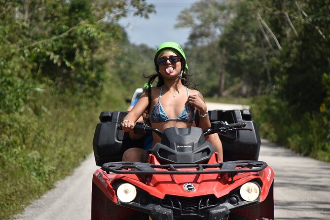 Adrenaline Tour with ATV, Ziplines and Cenote from Cancun - ATV riding on rough jungle trails