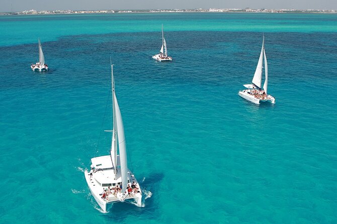 All-Inclusive Isla Mujeres Catamaran with Free Transportation - Snorkeling at El Meco Reef for 50 minutes