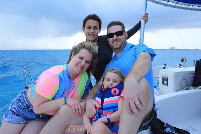 All Inclusive Isla Mujeres Catamaran - Boarding a catamaran with a party atmosphere