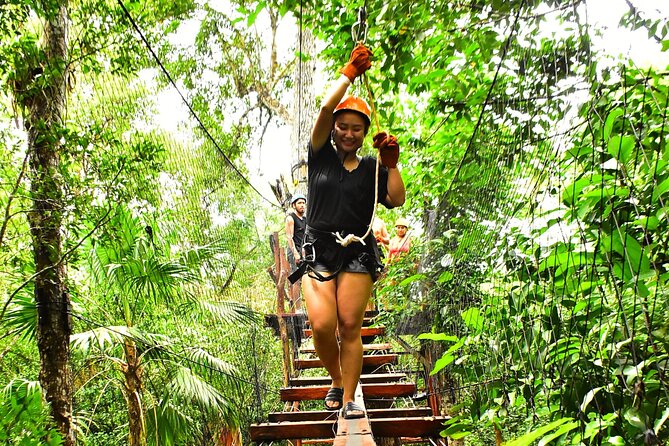 ATV Adventure, Interactive Bridges, Ziplines, Cenote and Lunch - Three ziplines and hanging bridges through the trees