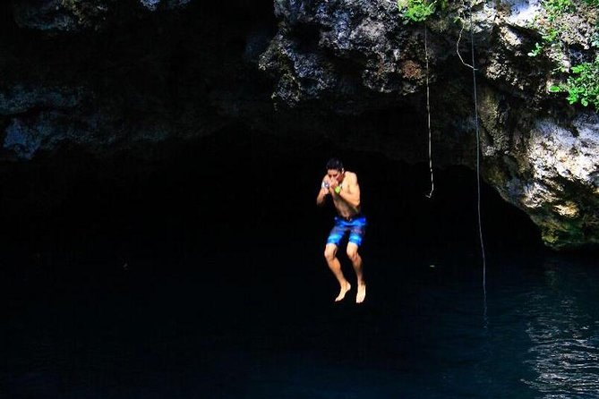 ATV Tour with Cenote swim, Ziplines, Transportation and Lunch Included - Swimming in a Mayan Cenote