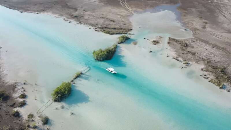 Bacalar: 3 Hour Boat Trip with Swimming & Drinks - Cenote Esmeralda, the lagoon’s largest cenote