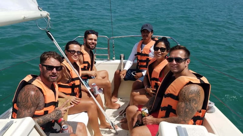 Bacalar: Group Sailing Trip with Swimming and Drinks - Cenote Esmeralda sets the tone