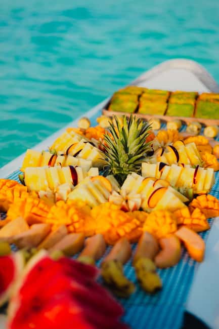 Bacalar Lagoon Sailing Tour with Open Bar and Mexican Lunch - Swimming in clear turquoise water