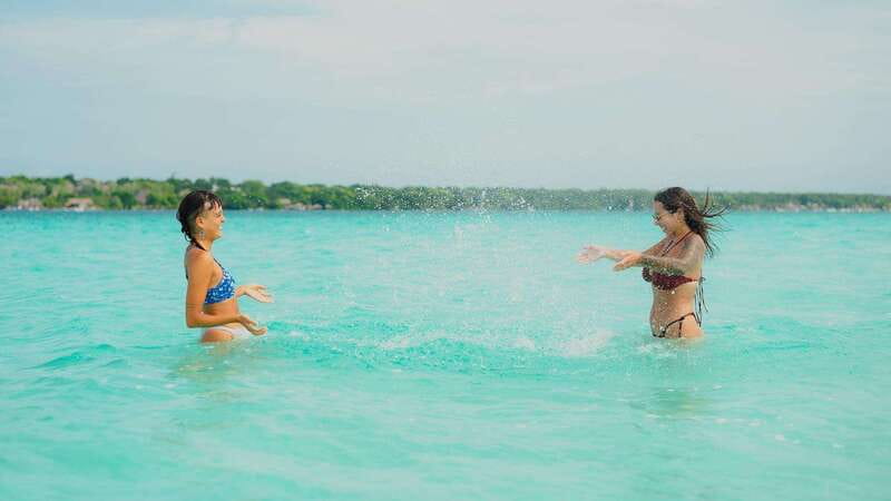 Bacalar Lagoon Sightseeing Boat Tour with Open Bar & Snack - The secret stop turns into a floating picnic