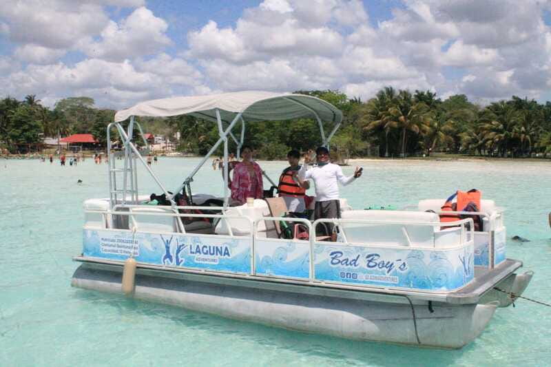 Bacalar: Lake of Seven Colors Pontoon Tour with Fruit - Swimming in the shallow blue water