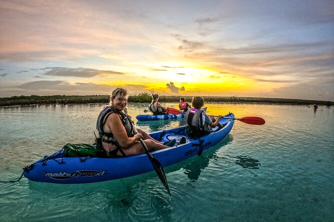 Bacalar Sunrise in Kayak - Canal de los Piratas, swimming, and snorkeling