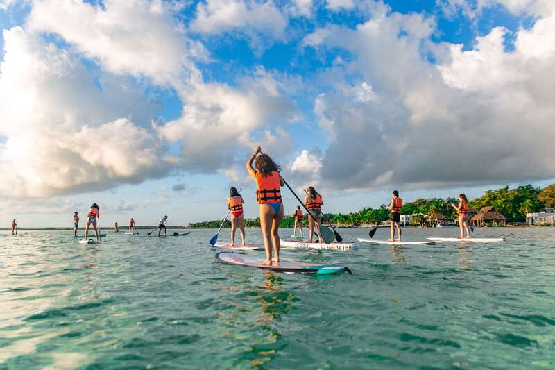 Bacalar: Sunrise Paddleboard Tour with Floating Picnic - What the guides add to the experience