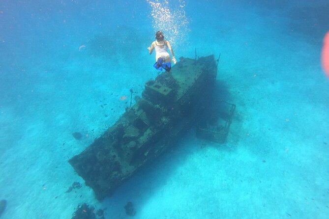 Bavarian Fiesta Snorkel Activity in Glass Bottom Boat at San Miguel de Cozumel - The glass-bottom boat and onboard crew