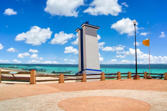 Beachside Tacos & Town Tour with Tequila Tasting From Cancun - Walking through the main square and flea market