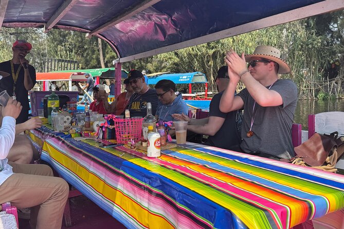 Boat tour in Mexico City with Live Guide with Food and Drinks - Reaching Xochimilco from central Mexico City