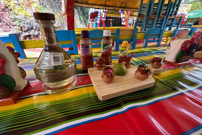Boat tour in Mexico City with Live Guide with Food and Drinks - Drinks, games, and the party-boat side