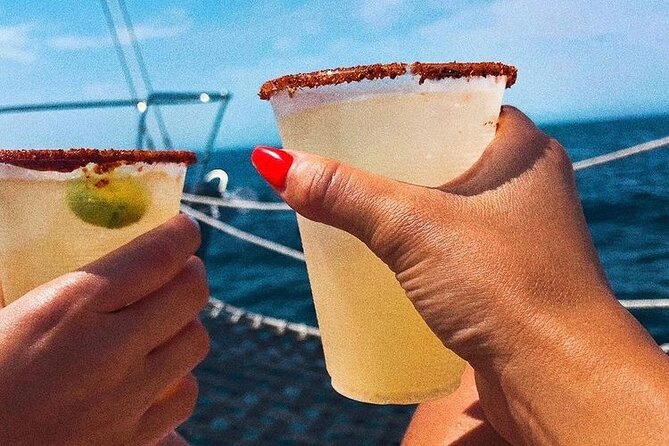 Cabo San Lucas Sunset Cruise with Open Bar and Snacks - Open Bar, Music, and the Ride Back
