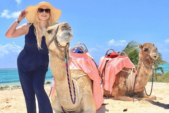 Camel Expedition and Beach Club In Riviera Maya - Getting onto the camel safely