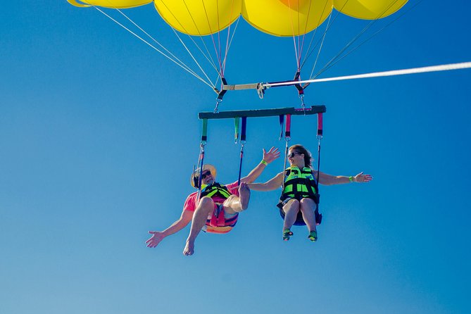 Cancun Adventure: Reef Snorkeling & Parasailing Experience - Coral reef fish, stingrays, and turtles