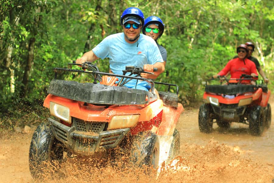 Cancún: ATV, Zipline, and Cenote Adventure with Lunch - Ziplining above the jungle