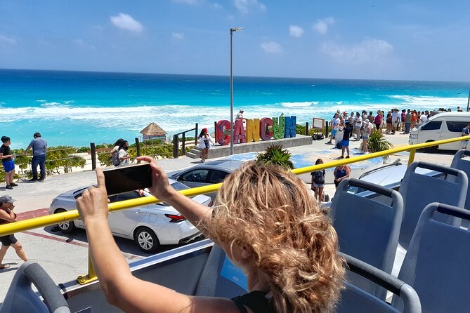 Cancun City Sightseeing and Shopping Tour on a Double Decker bus - Drinks are useful, but bring food