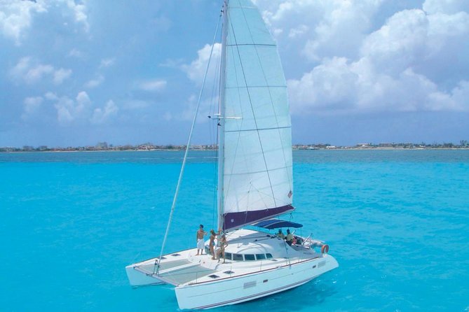 Cancun Half-Day Sailing Catamaran Cruise to Isla Mujeres - Sailing over Cancun’s turquoise water