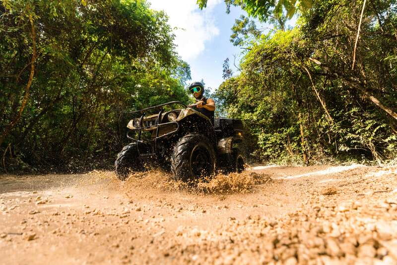 Cancun: Jungle ATV Tour, Ziplining, and Cenote Swim - Three ziplines through the canopy