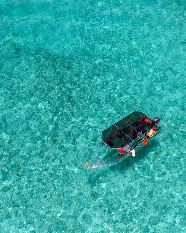 Cancún: Nichupté Lagoon Transparent Boat Tour with Drinks - The first 25 minutes: scenic views across the lagoon
