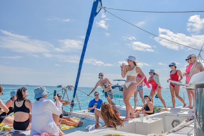 Cancun's Best: Catamaran to Isla Mujeres, Snorkeling & Drinks! - Snorkeling in open Caribbean water