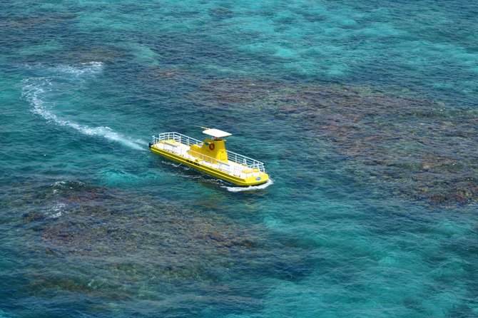 Cancun Submarine and Optional Snorkeling Tour - Weather cancellations and planning around uncertainty