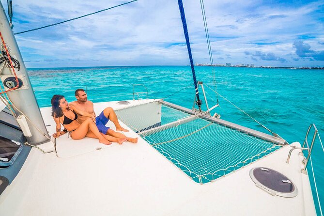 Catamaran to Isla Mujeres Snorkeling Tour with Open Bar and Lunch - The return sail and Cancun sunset