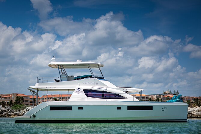 Cozumel All Inclusive: Coast & Relax 4h on 51' Leopard - Snorkeling, Paddleboards, and Floating Time