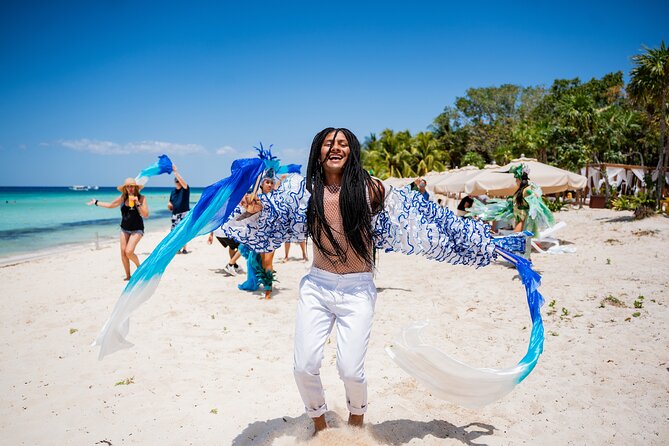 Cozumel: KUZÁ Beach Day, Buffet, Open Bar & Mexican Flavors Class - Music, games, and Mexican cultural activities