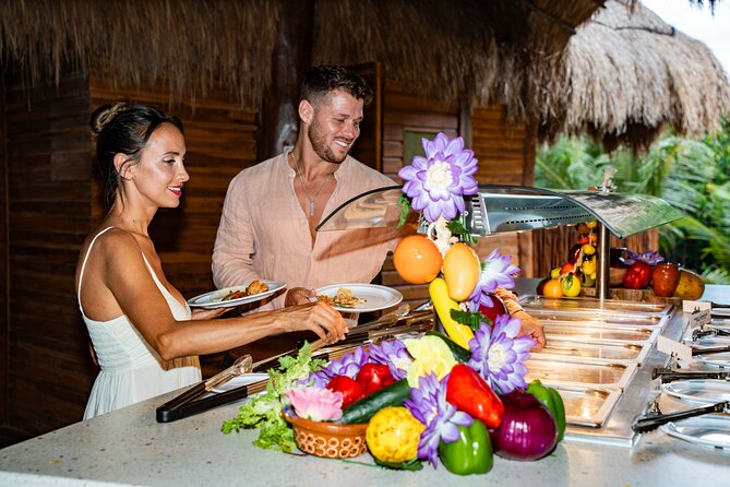 Cozumel: KUZÁ Beach Pass with Buffet, Open Bar & Activities - Eco trails and shaded breaks away from the water