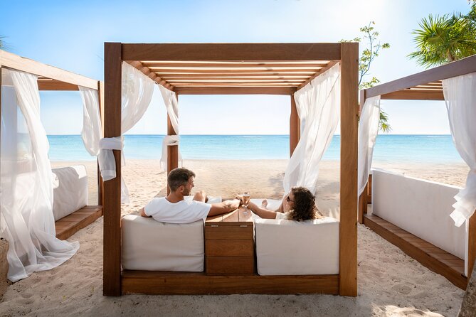 Cozumel: VIP Access Pass at KUZÁ Beach & Adventure Park - Arrival starts with a chilled towel and Prosecco