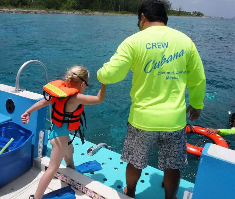 Cozumel: VIP Glass Bottom Boat & Snorkeling 3 Reefs Tour - Boarding the glass-bottom boat