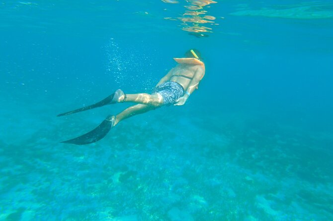 Dancer Cruise Isla Mujeres Snorkel Food and Drinks Included - Isla Mujeres in two different moods
