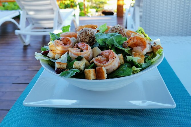 Day excursion to a PRIVATE LUXURY BEACH CLUB with transportation. - The return transfer and cruise-ship timing