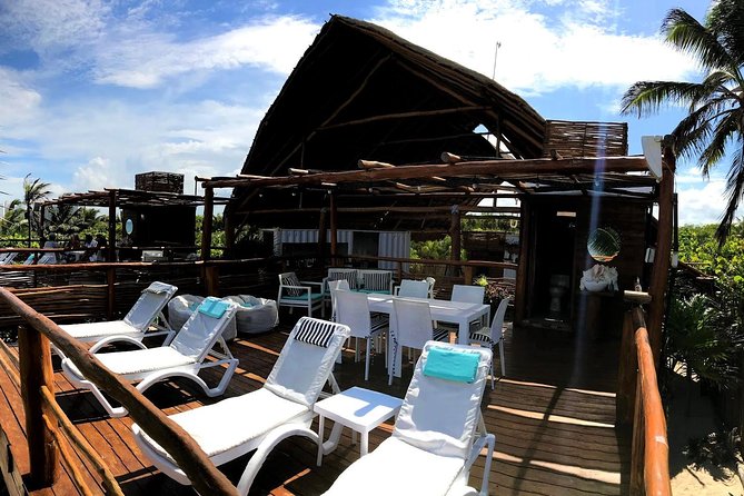 Day excursion to a PRIVATE LUXURY BEACH CLUB with transportation. - The beach, with a serious seasonal warning