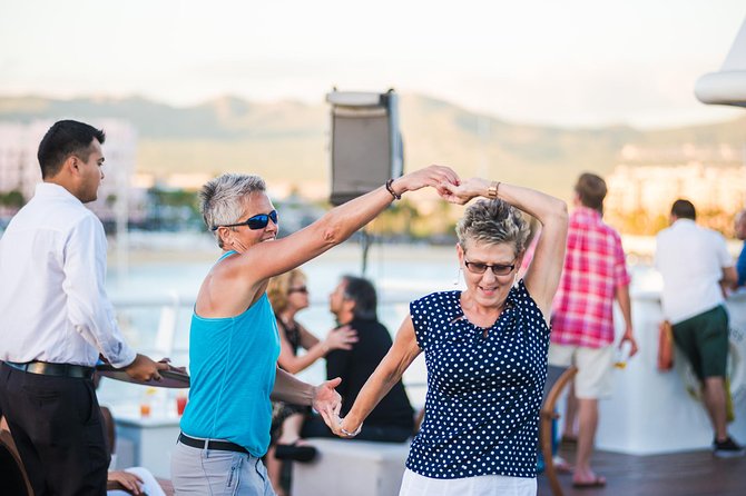 Dinner Cruise Tour in Cabo San Lucas with Tequila Tasting - Boarding the catamaran near the marina