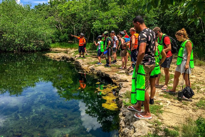 E-bike West Coast Snorkeling Tour - Riding the e-bike through Cozumel