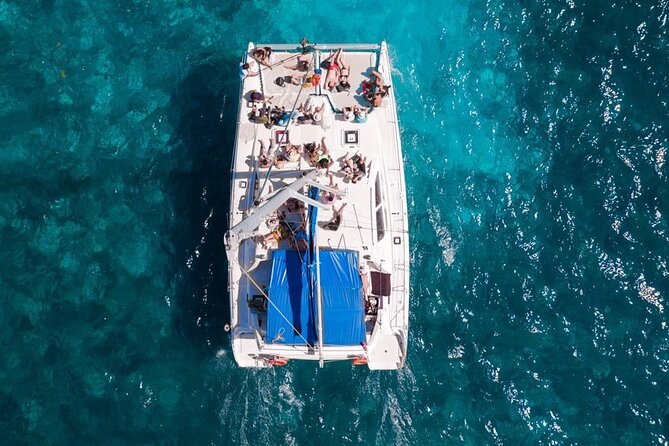 Exciting Catamaran Tour to Isla Mujeres, from Cancún! - Snorkeling in Cancun’s clear water