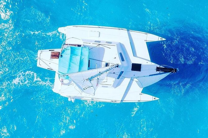 Exciting Catamaran Tour to Isla Mujeres, from Cancún! - Spinnaker flying and other water fun
