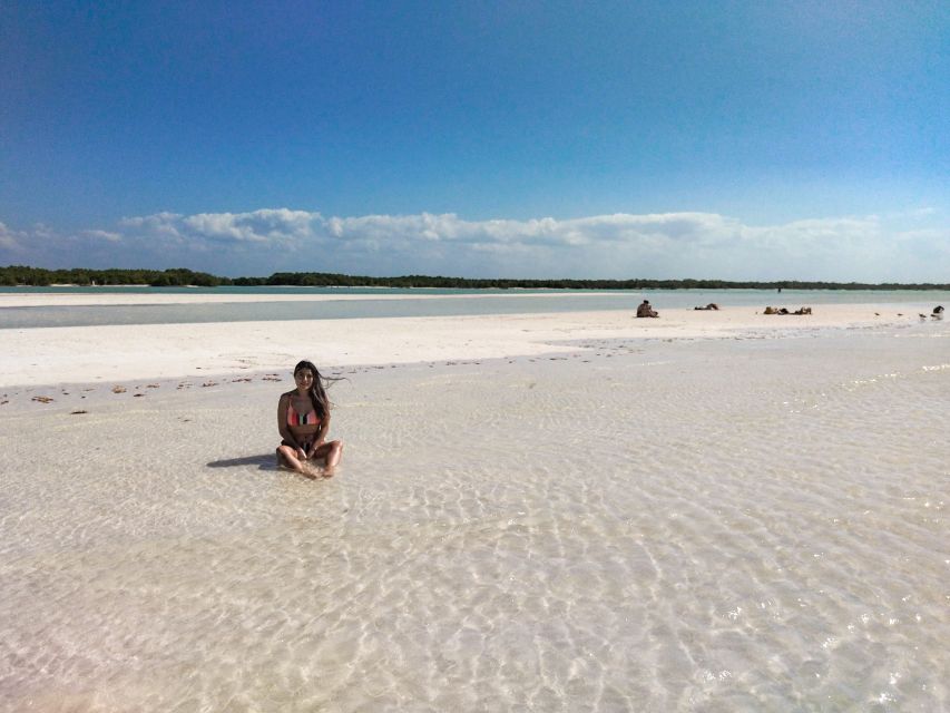 From Cancun or Puerto Morelos: Holbox Boat Tour with Lunch - Yalahau Lagoon and the Hoyo Negro Stop