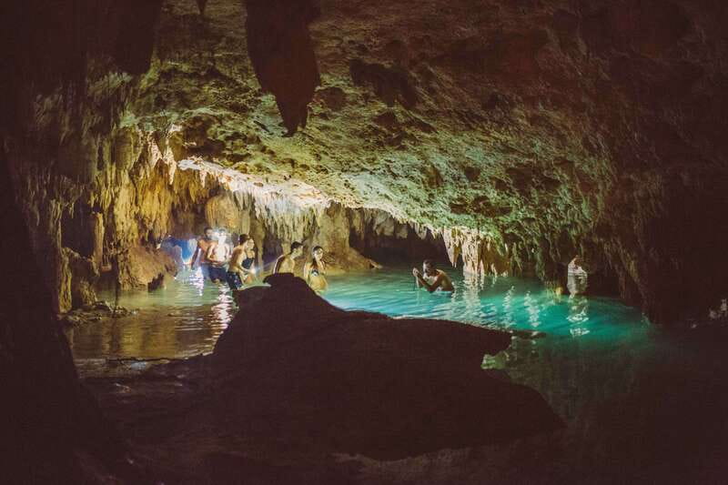 From Riviera Maya: Snorkeling & Private Cenote Half-Day Tour - Entering the limestone cave and finding the cenote