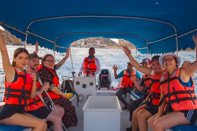 Glass-bottom boat tour to the Arch + beach time - Riding out toward El Arco