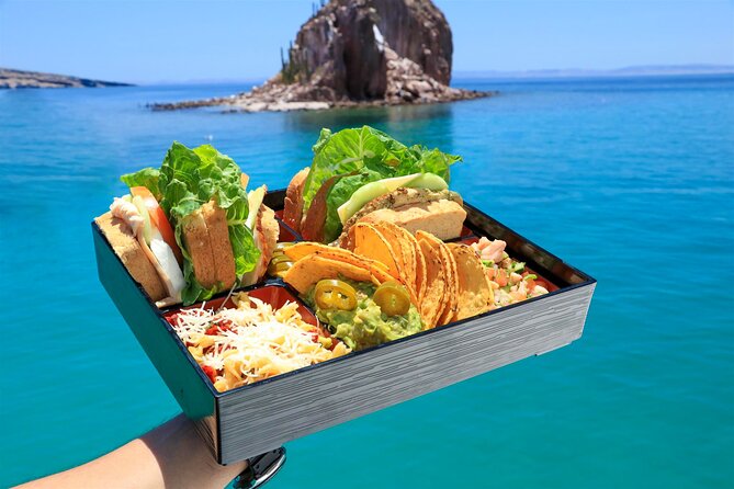 Half Day Cabo Snorkel Adventure with Lunch and Open Bar - Lunch, Guacamole, and Drinks on the Way Back