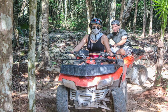 Half Day in Cancun Atvs Ziplines and Cenote Park - Cooling off in the cenote
