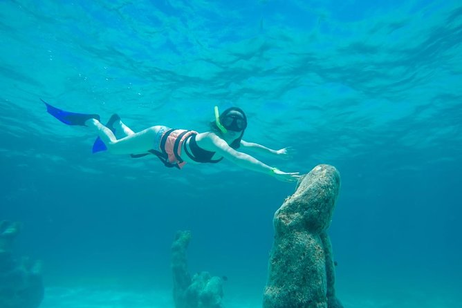 Half Day Sailing Private Catamaran to Isla Mujeres - Timing, meeting point, and practical comfort