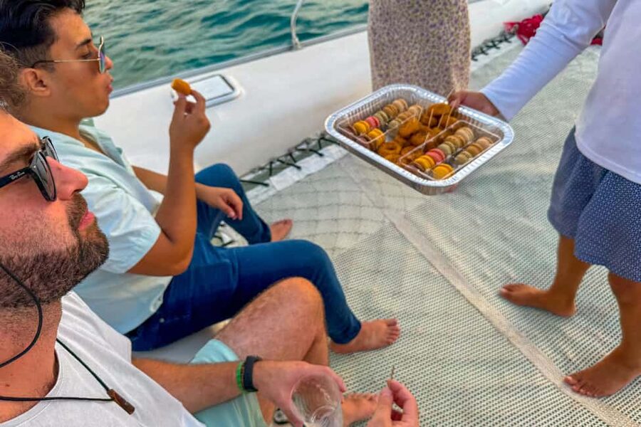 Isla Mujeres: Catamaran Ride with Open Bar, Snorkeling, and Lunch - The return sail to Cancun