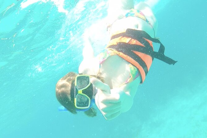 Isla Mujeres Catamaran Tour from Cancun with Snorkel and Open Bar - Spinnaker Flying and the Ride Home