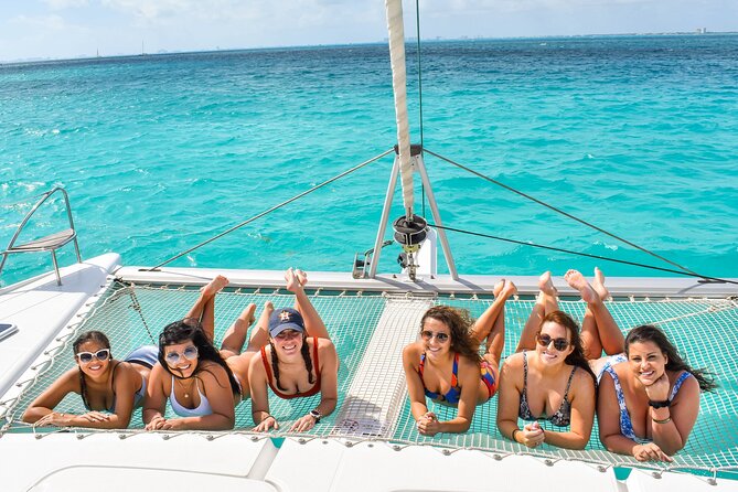 Isla Mujeres Catamaran Tour with Snorkel, Open bar and Transport - Playa Norte and the question of island time